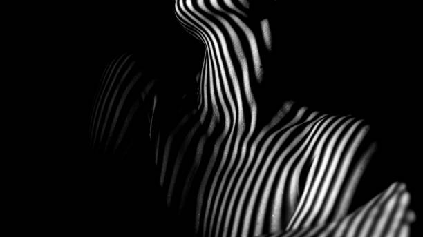 istock Female body in stripes 1456042561