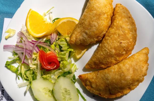 istock Shrimp empanadas with salad, tropical food from Mexico 1456047764