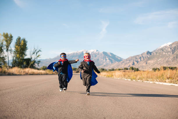 business duo superheroes - partnership creativity superhero child imagens e fotografias de stock