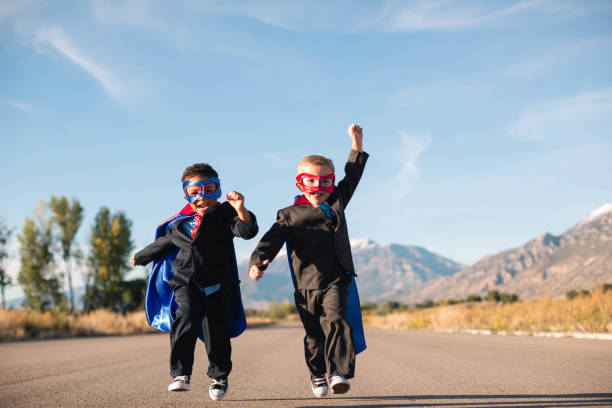 business duo superheroes - partnership creativity superhero child imagens e fotografias de stock