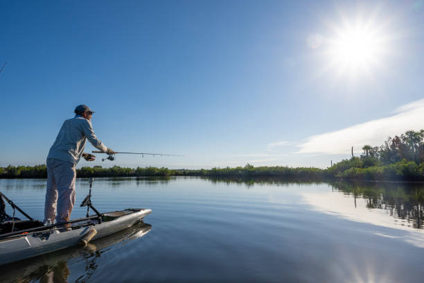 Stand-Up Kayaker Fishing in Florida stock photo