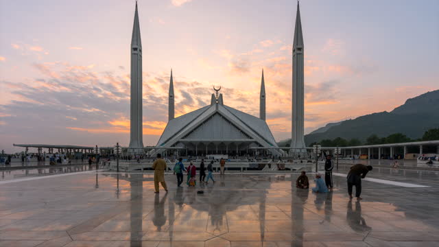Timelapse Sunset Scene Moving Cloud and People at Faisal Mosque famous travel location in Islamabad Pakistan