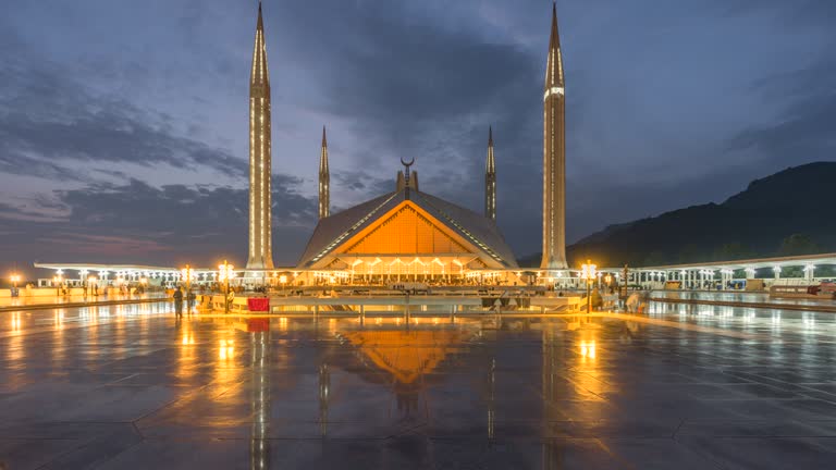 Timelapse Sunset Scene Moving Cloud and People at Faisal Mosque famous travel location in Islamabad Pakistan