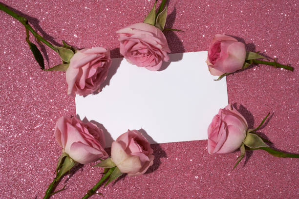 istock greeting card and pink roses 1456056610