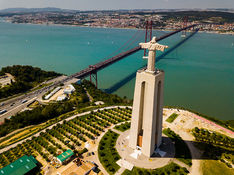Panoramic view of 25th of April bridge and Lisbon cityscape