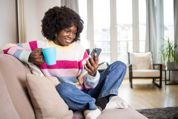 istock Portrait of a young woman using smartphone 1456063100