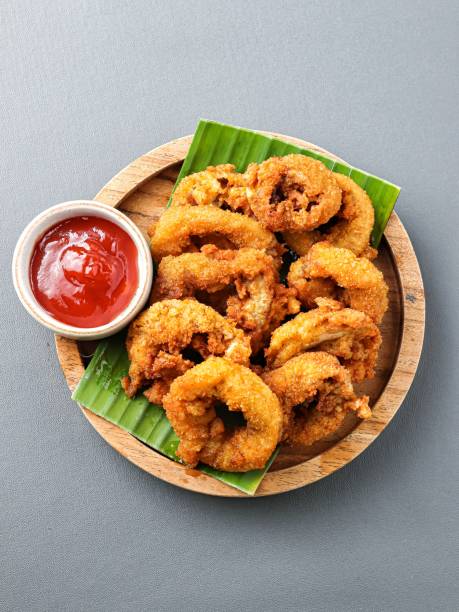 istock Fried Squid or calamari with Curry Seasoning. 1456064073