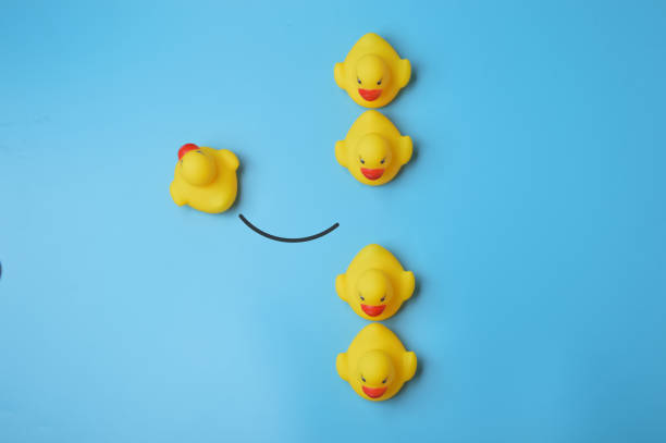 istock Toy duck walking to different way. individuality and different creative idea concept 1456068652