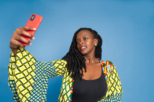 istock African American woman taking selfie 1456069589