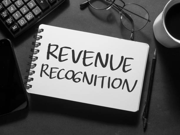 istock Revenue Recognition, text words typography written on book against dark background, life and business motivational inspirational 1456074454