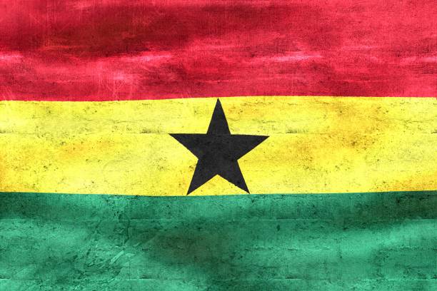 istock Ghana flag - realistic waving fabric flag 1456074634