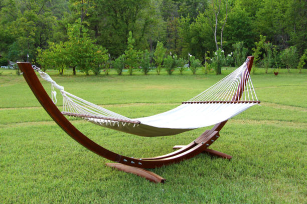 Empty hammock in the garden stock photo