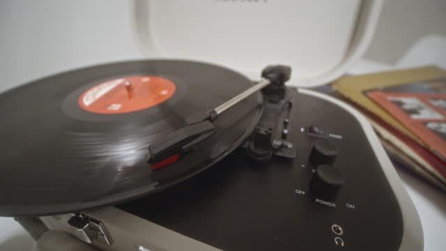 Vinyl album LP playing on traditional record player