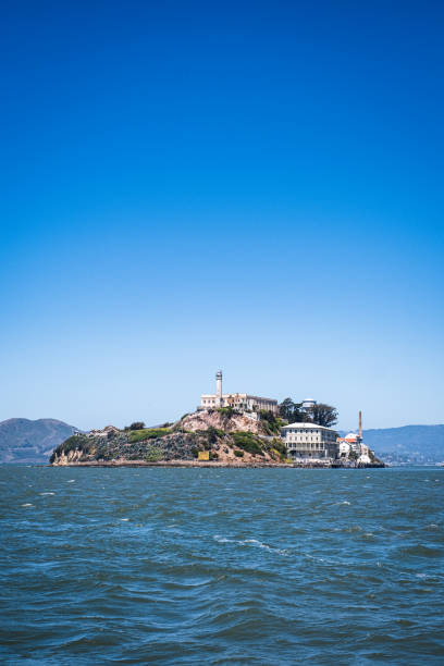 Vertical Shot of Alcatraz from the Approaching Ferry stock photo