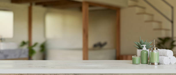 istock Montage space on white marble tabletop over blurred bathroom in the background 1456083208