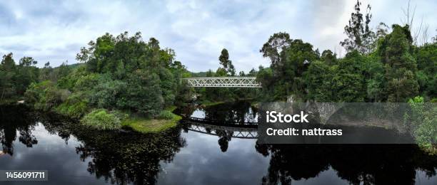 Old Bridge Crossing A Beautiful River Stock Photo - Download Image Now - Above, Aerial View, Architecture