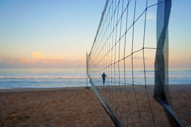 istock Sport net on the beach at sunrise. 1456096397