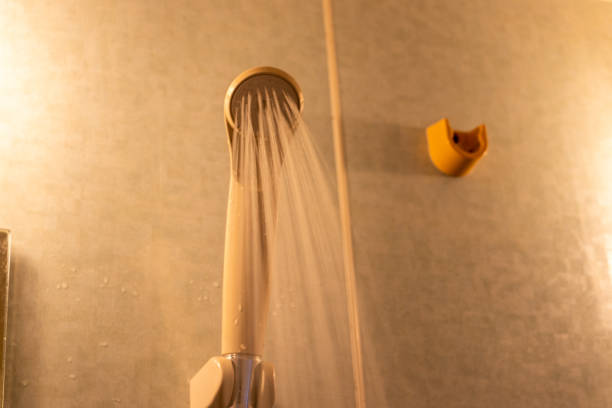 istock Shower head blowing out water 1456101143