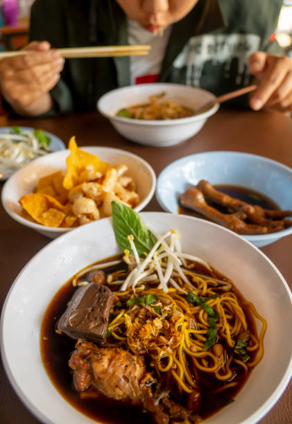 istock Stewed chicken rice noodle soup Thai style 1456106076