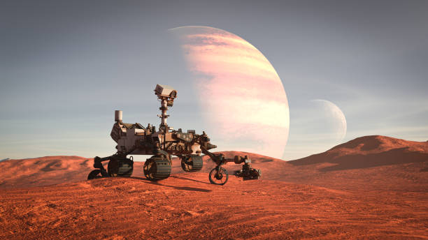 istock Mars rover exploring surface of Mars. Image of automated robotic space autonomous vehicle on the red Mars planet. Space exploration, astronomy science concept. 3D render 1456106126