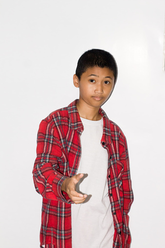 portrait Asian boy wear casual shirt on isolated white background