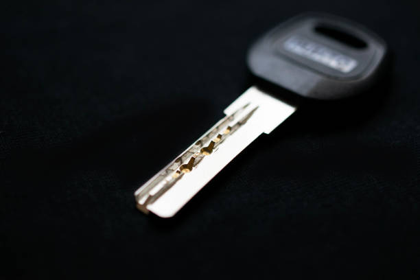 istock one key to the apartment on a black background.selective focusing 1456114053