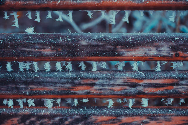 old wooden planks covered with frost at winter season