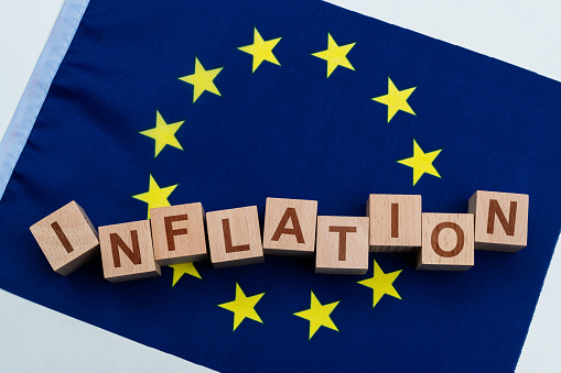 Word inflation on European Union flag.