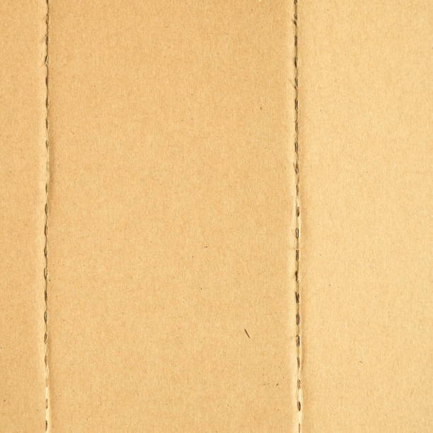 istock brown cardboard paper box, paper textured background 1456117419
