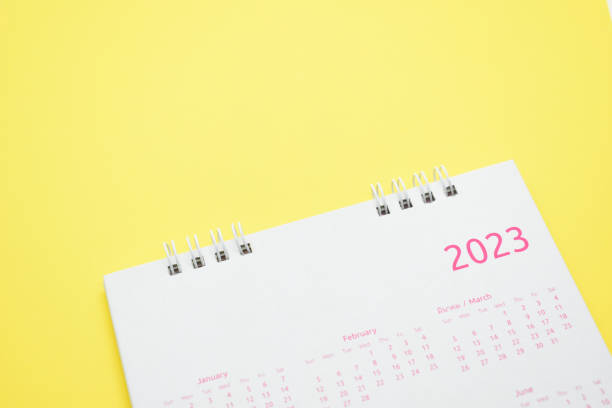 istock white calendar 2023 on yellow background 1456117576
