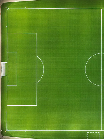 Penalty are from a soccer field seen from above.
