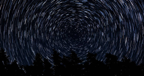 istock Star trails in the night sky 1456118770