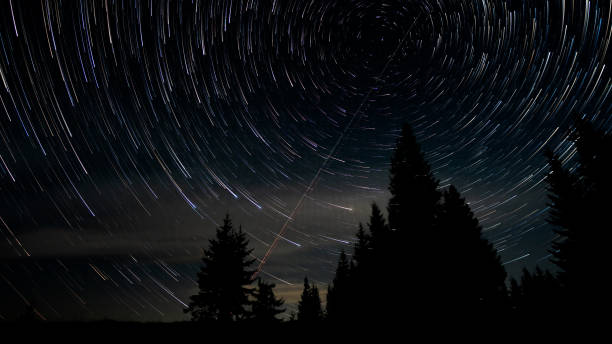 istock Star trails in the night sky 1456118816