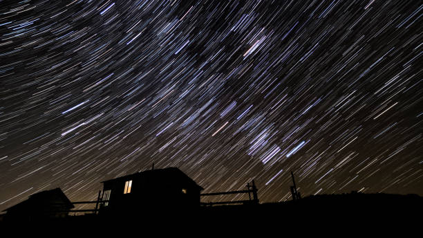 istock Star trails in the night sky 1456118846