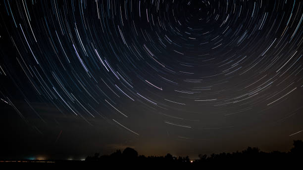 istock Star trails in the night sky 1456118862