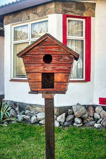istock wooden bird house 1456124418