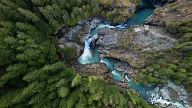 Photo of Top view of the Green River in Nairn Falls Provincial Park, surrounded by rocks and evergreen forest