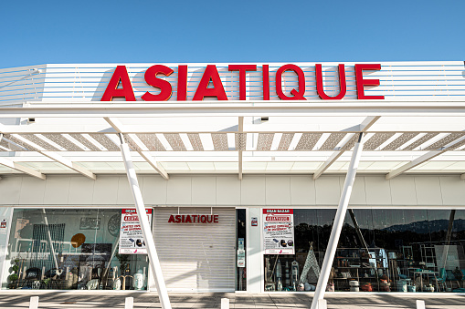 Malaga, Spain – January 23, 2022: An Asiatique shop in Malaga, Spain