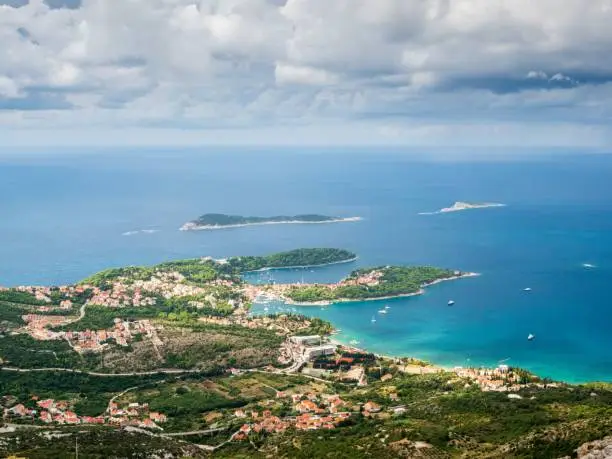 An aerial view of the village of Cavtat located by the shore of the sea
