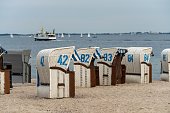 istock Beach with roofed wicker chairs in Schilksee, Kiel, Germany 1456124818