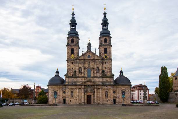 istock Fulda Cathedral with a cloudy sky in the background, in Fulda, Germany 1456125033