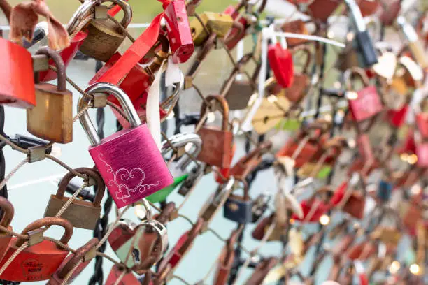 Photo of Beautiful shot of colored padlocks with heart shape - Valentine's Day concept