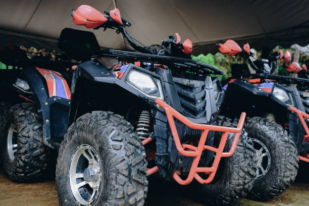 istock Closeup of quad bikes parked outside 1456128545
