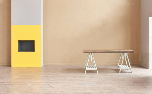 istock modern home interior in man home office and study desk laptop fireplace frame plant flower. 1456130545