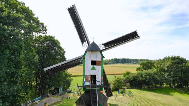 istock Windmill in a village 1456131417