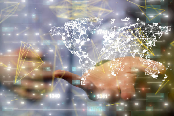 istock Businessman holding a digital render of a connected global network 1456131627