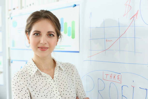 istock Woman business coach conducts training in marketing and analytics 1456132711