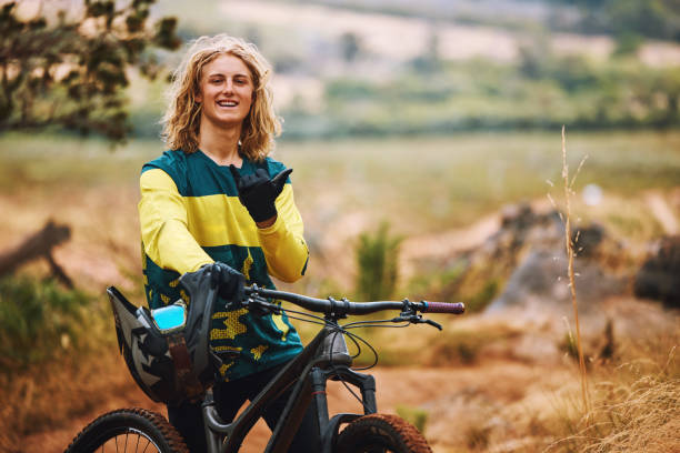 Girl with Long Hair Leaning on a Bike on a Field · Free Stock Photo Girl with Long Hair Leaning on a Bike on a Field · Free Stock Photo