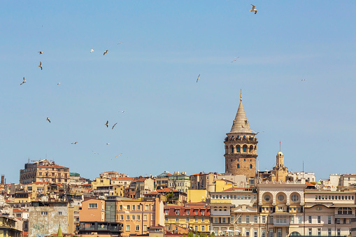 Istanbul, Turkey, April 29, 2022 - Cityscape with Galata Tower and Gulf of the Golden Horn in Istanbul, Turkey in a beautiful summer day. Tourism or architecture history concept