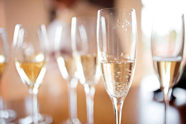 istock Row of champagne glasses on a wedding day 1456137790